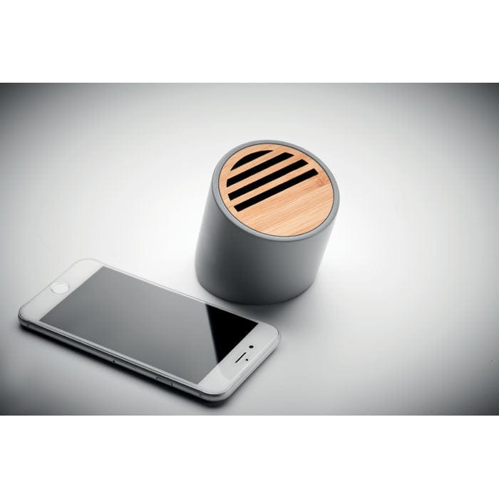 Speaker wireless in cemento calcareo e bamboo grigio - personalizzabile con logo