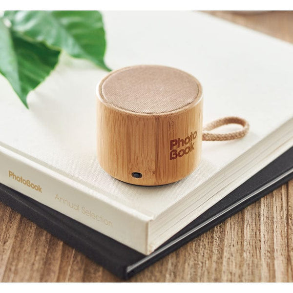 Speaker wireless rotondo in bamboo beige - personalizzabile con logo