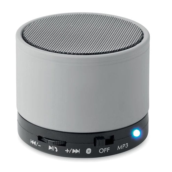 Speaker wireless rotondo in ABS con finitura gommata e LED color argento - personalizzabile con logo